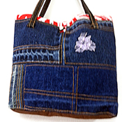 Handbag with a blue bow